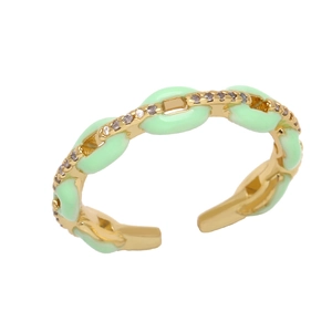 Detailed macro view of mint green enamel hollow chain ring with sparkling white zircons