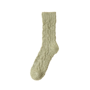 Thick coral fleece crew socks in light green with warm cable knit texture for winter