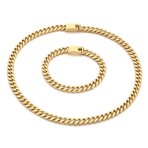 Polished golden 8mm Cuban link chain necklace and bracelet set with buckle clasp