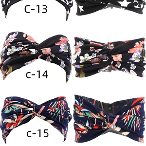 Detailed flat lay of bohemian twist headbands with star and floral print patterns