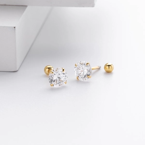 Detailed close-up of S925 sterling silver screw back earrings with 4-prong zircon setting