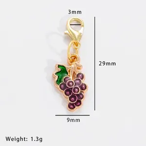 Detailed size view of a purple enamel grape charm with lobster clasp for DIY jewelry