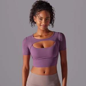 Close-up of purple crop top yoga shirt featuring breathable front cutout detail