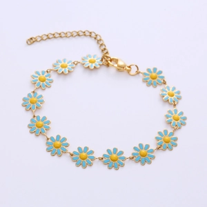 Bohemian gold plated daisy flower bracelet with blue and yellow enamel petals