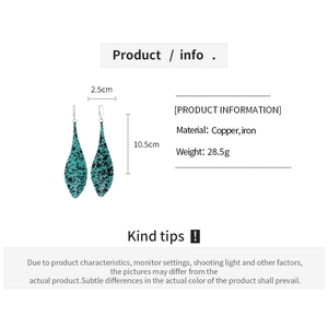 Detail shot of boho water drop earrings showing copper material and dimensions
