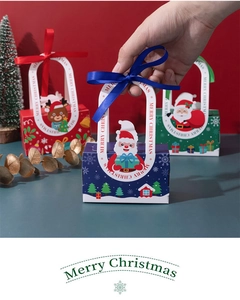 Close-up of colorful Christmas gift boxes with Santa patterns and silk ribbon handles