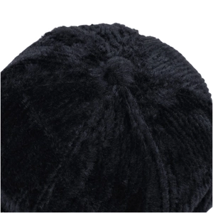 Macro view of plush black faux mink baseball cap showing dense vertical striped texture