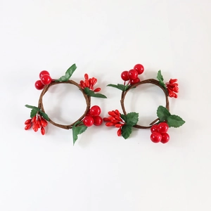 Artificial red berry Christmas napkin rings with green leaves for holiday table decor