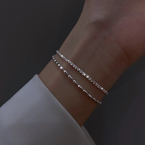 Elegant 925 silver plated layered bracelet featuring star and bead charms for women