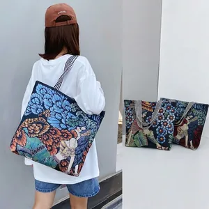 Artistic retro floral canvas tote bag with striped handles for stylish daily commuting