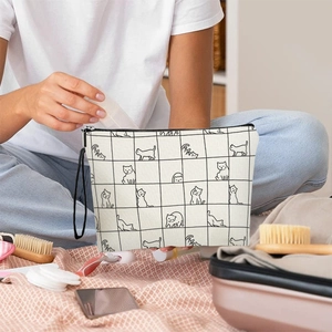 Checkered canvas cat makeup bag with black zipper and portable wrist strap handle
