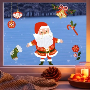 Stickers de Noël avec Père Noël et cloches sur une fenêtre en verre d'ambiance chaleureuse