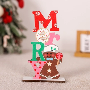 Macro detail of wooden Christmas table sign with Merry text and gingerbread man