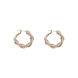 Elegant gold twisted hoop earrings with sparkling cubic zirconia on a clean white background