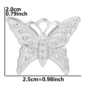 Macro view of butterfly charm with dimensions 2.0x2.5cm in silver stainless steel