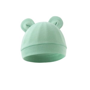 Close-up of mint green baby bear ear hat showing soft ribbed knit texture on white background