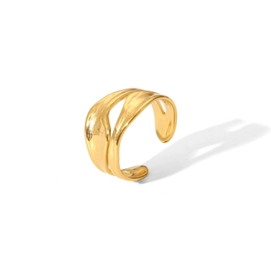 Close-up of polished gold striped open ring showing smooth metallic texture and adjustable band