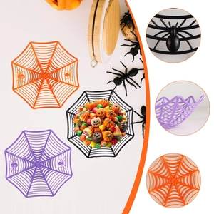 Detailed view of Halloween spider web candy bowls in orange, purple, and black plastic