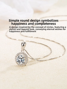 Macro shot of silver circular halo pendant with zircon stone on a classic box chain