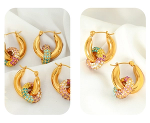 Detailed macro view of gold hoop earrings featuring multi-color pavé set rhinestones