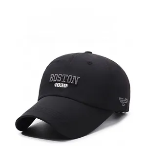 Detail of grey 3D embroidery showing BOSTON 1630 on black cotton baseball cap