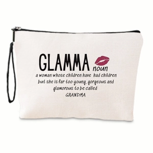 Close-up of canvas makeup bag with GLAMMA text print and red lip detail