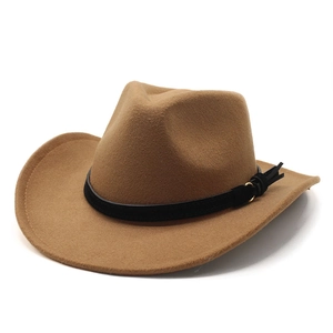 Close-up of wool western cowboy hat with black decorative band and golden metal buckle