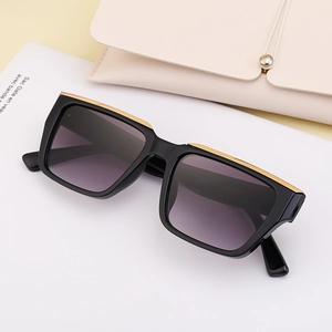 Square polarized sunglasses with black frames, gold trim, and gradient purple lenses