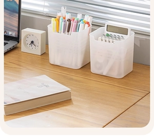 Translucent frosted desktop organizer for office stationery on a natural wooden desk