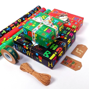 Birthday gift wrapping paper set with colorful letter prints, ribbons and jute twine