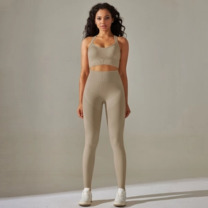 Front full view of seamless high waist yoga leggings and cropped racerback tank top in khaki