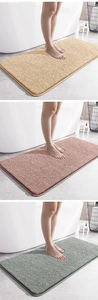 Detailed comparison of beige, pink, and grey quick-dry plush bathroom mats on tile floors