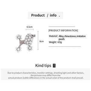Detailed view of rhinestone and pearl poodle brooch showing 6.5cm width and 6cm height