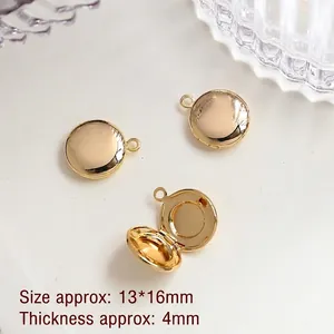 Macro detail of 14k gold plated round openable locket pendant with dimensions 13x16mm