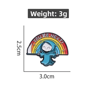 Detail showing cartoon reaper with rainbow pin and dimensions of 3.0cm by 2.5cm