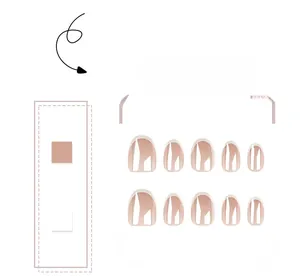 Flat lay of classic French style press-on nails with nude base and white tips