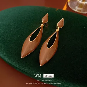 Vintage enamel drop earrings in caramel brown with gold-plated geometric frames