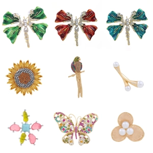 Collection of golden animal brooches with colorful enamel, rhinestones and pearls