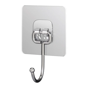 Strong transparent adhesive wall hook with silver metal hook on white background