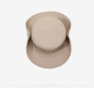 Top view of beige outdoor sun hat with breathable side mesh and wide brim detail
