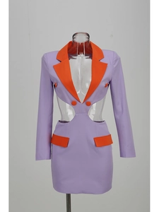 Detail of V-neck blazer dress featuring side cut-outs and purple-orange color block