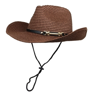 Close-up of brown straw cowboy hat featuring a black leather belt and adjustable chin strap