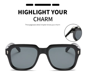 Detail view of reinforced metal hinge and side studs on vintage square sunglasses
