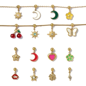 Assorted gold-plated stainless steel drip oil charms in heart, flower, and star shapes