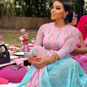 Women's chic printed long sleeve top and blue midi skirt set for outdoor picnic styling
