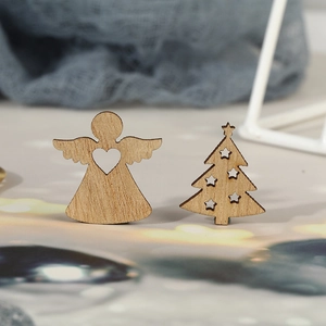 Minimalist DIY wooden Christmas ornaments featuring hollow angel and tree designs in natural wood