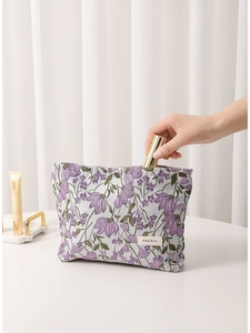 Portable lilac floral embroidery canvas makeup bag with secure zipper closure for travel