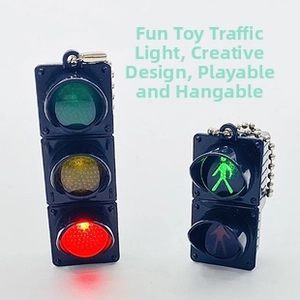 Mini traffic light keychain with LED glowing red yellow and green signal lights