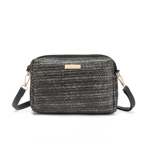 Minimalist woven crossbody bag in black and gray with gold metal hardware details