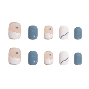 Short foggy blue and white press-on nails set with wave patterns and golden edges